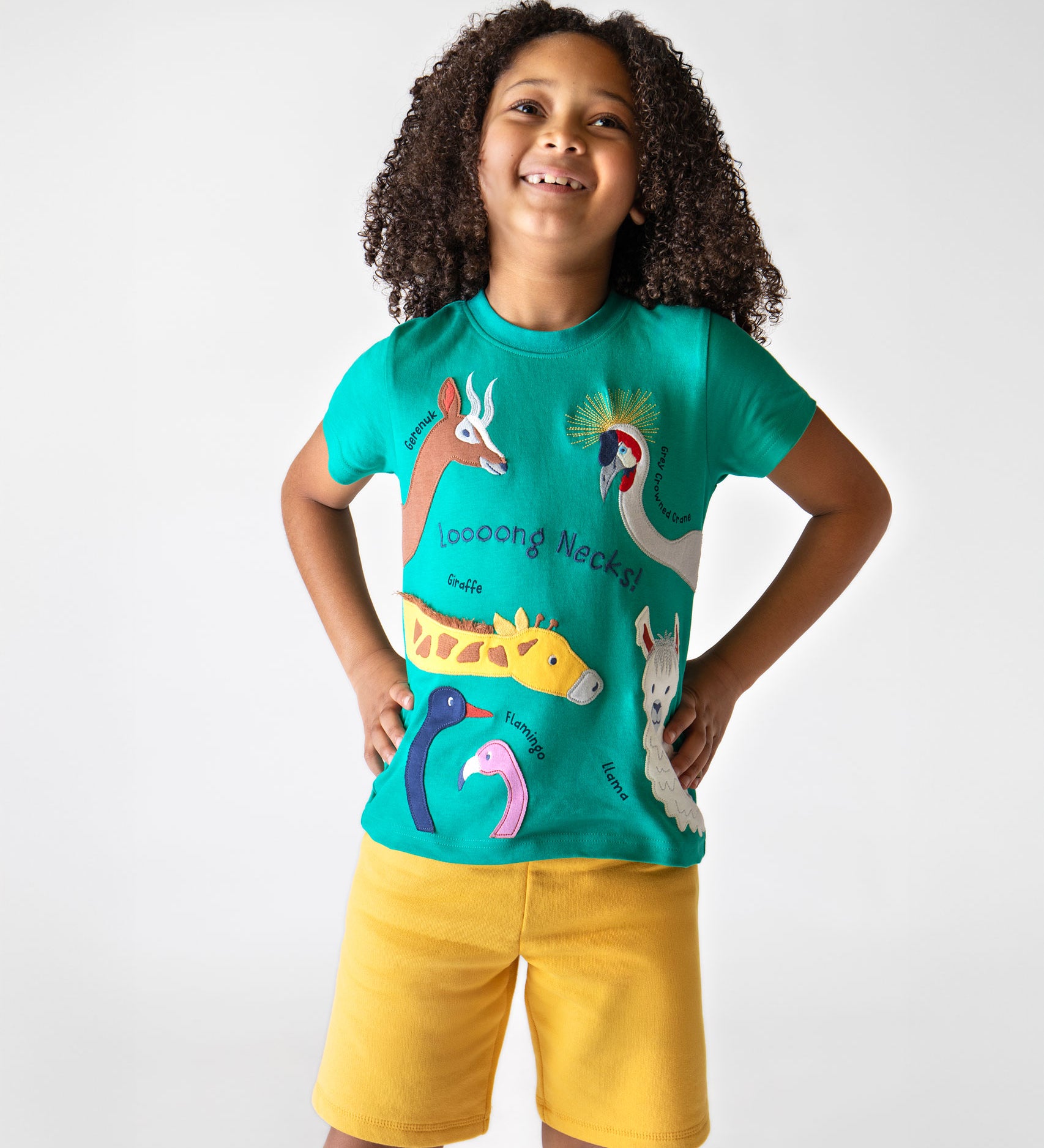 A child wearing a Frugi  Long Neck Pals Carsen Applique organic cotton T-Shirt