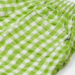 Close up of the Frugi kids macaw gingham Giles short showing the back pocket detail on green gingham organic cotton fabric