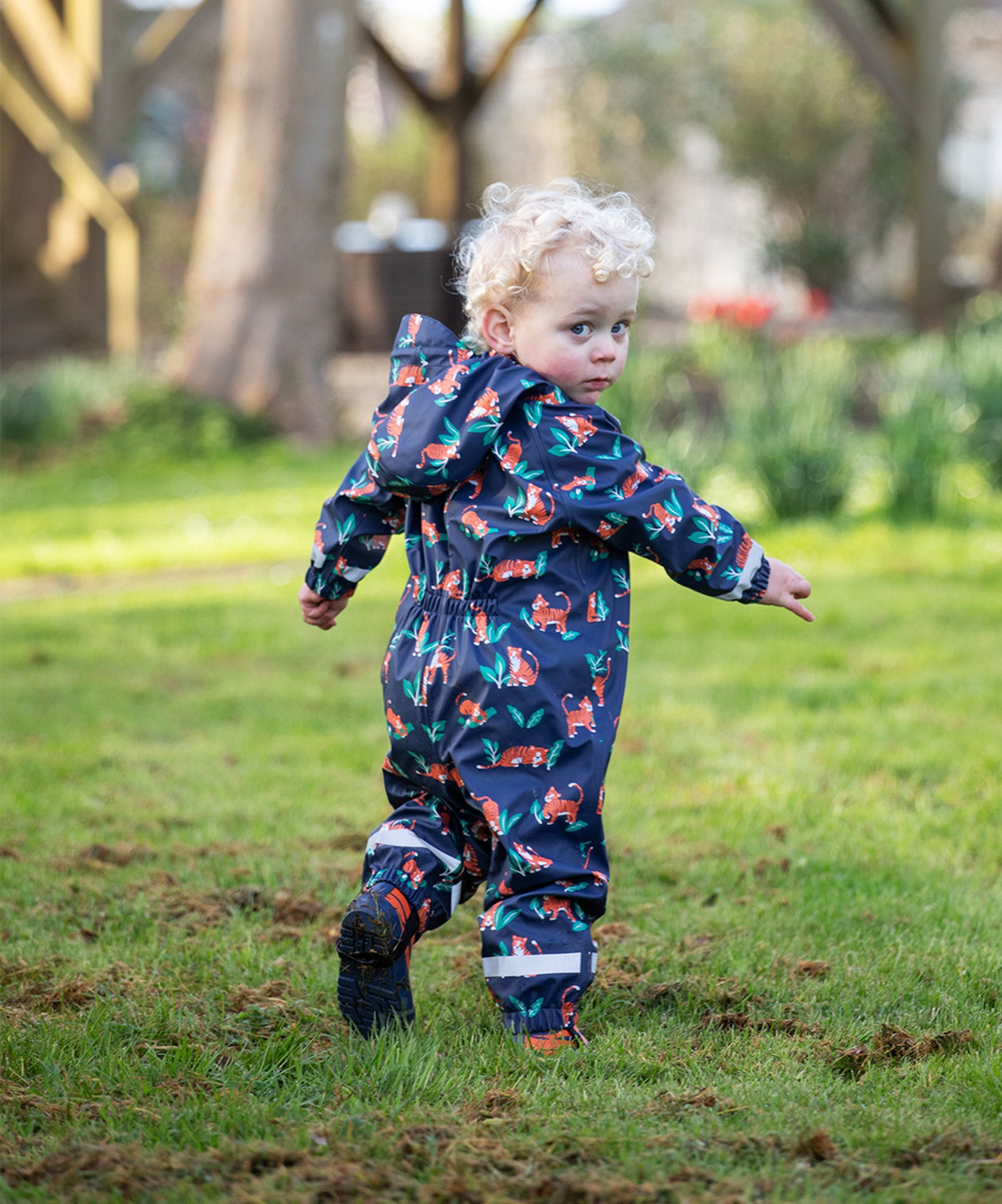 The back of the Frugi Children's Puddle Buster All In One - Tiger Time