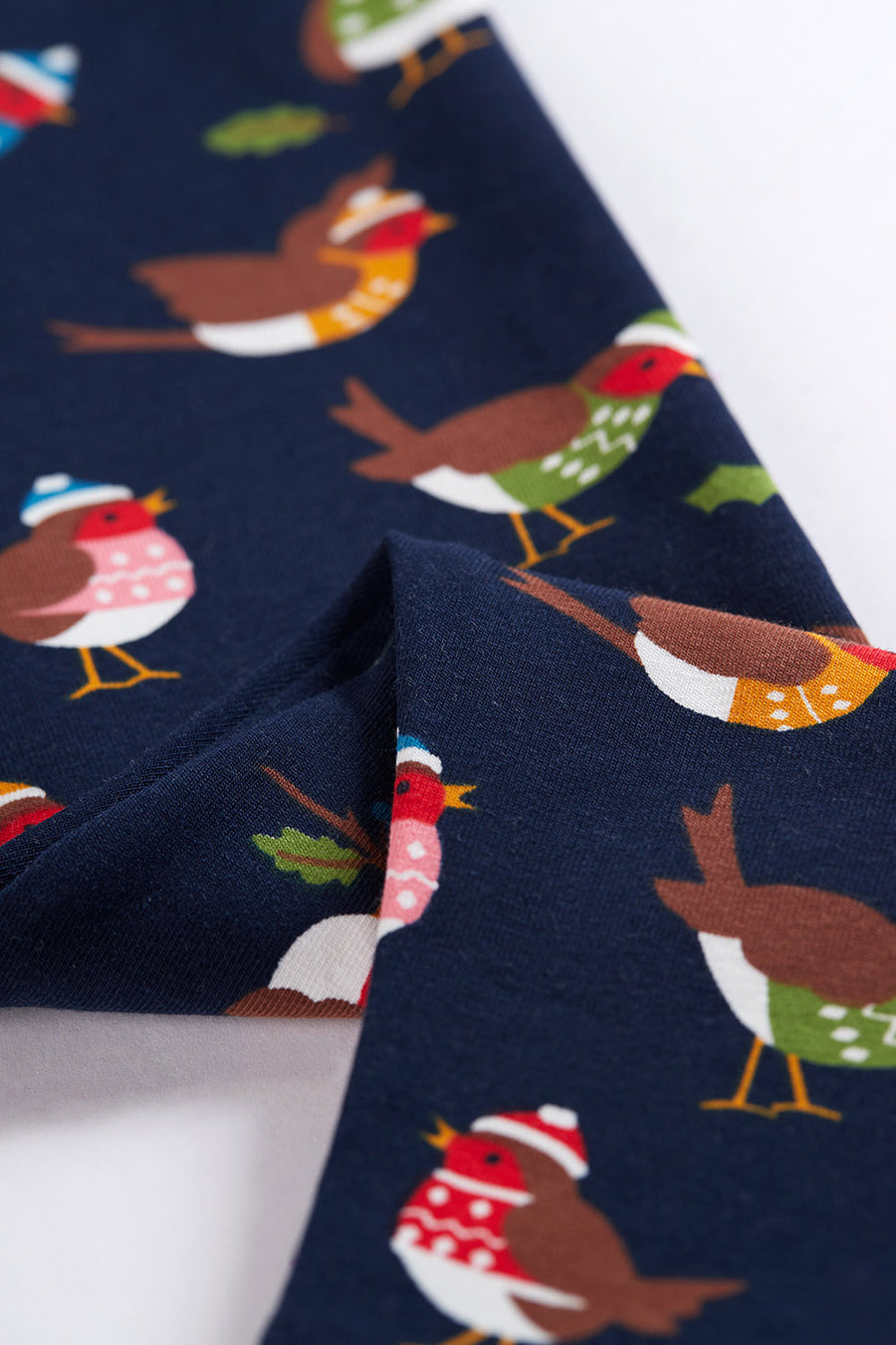 close up of frugi ola leggings robin pattern