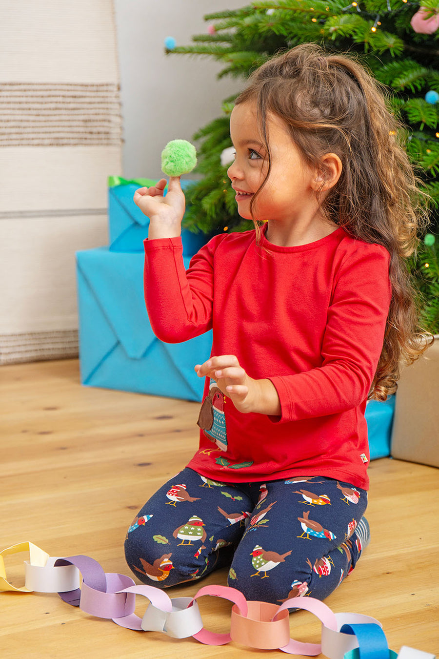 a girl wearing frugi ola outfit