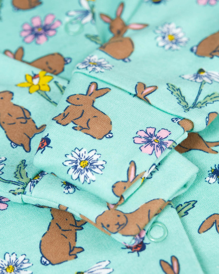  the set includes an all-in-one baby grow and a bib in a beautiful mint green fabric and bunny