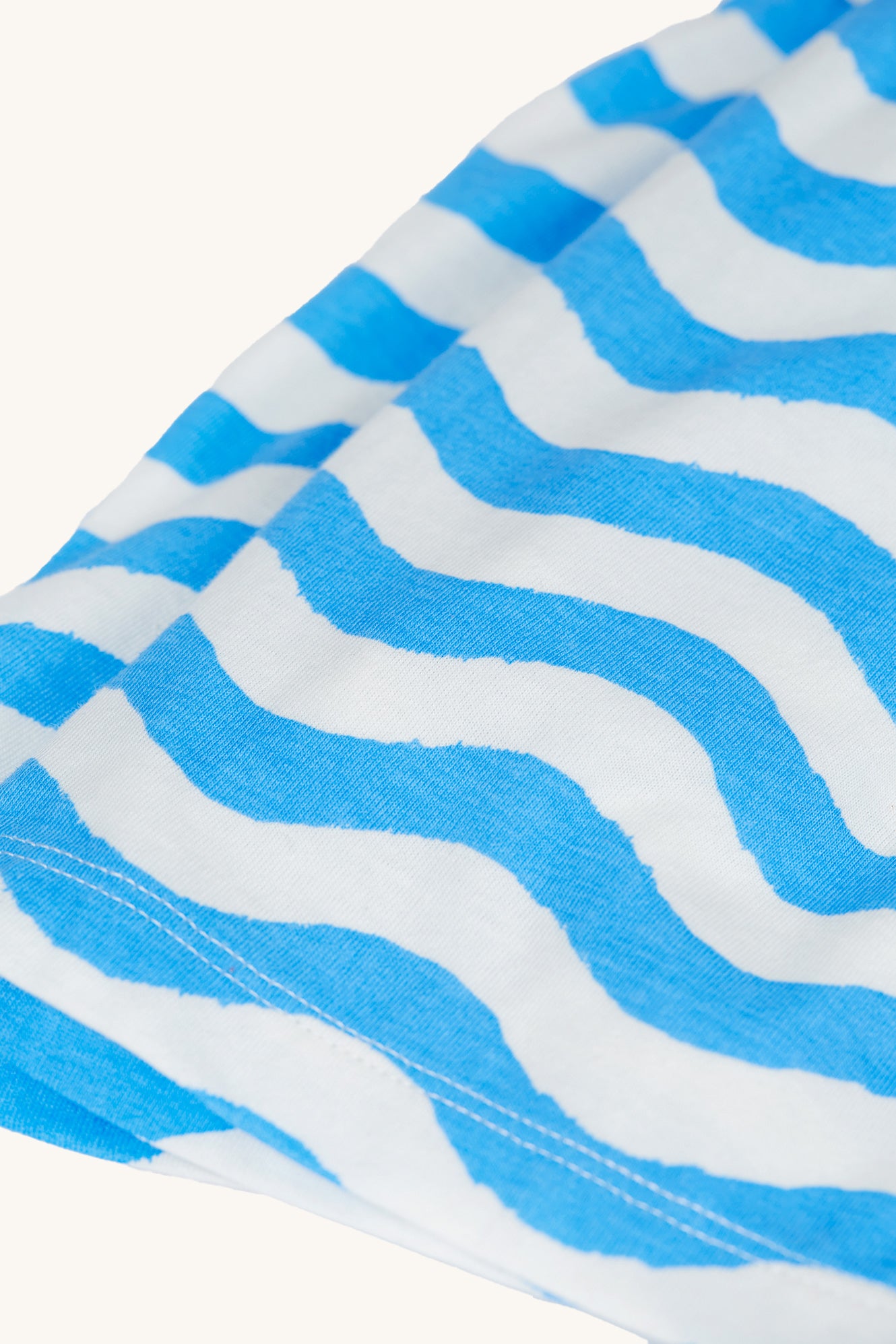  paired with light blue and white wavy stripe pyjama shorts