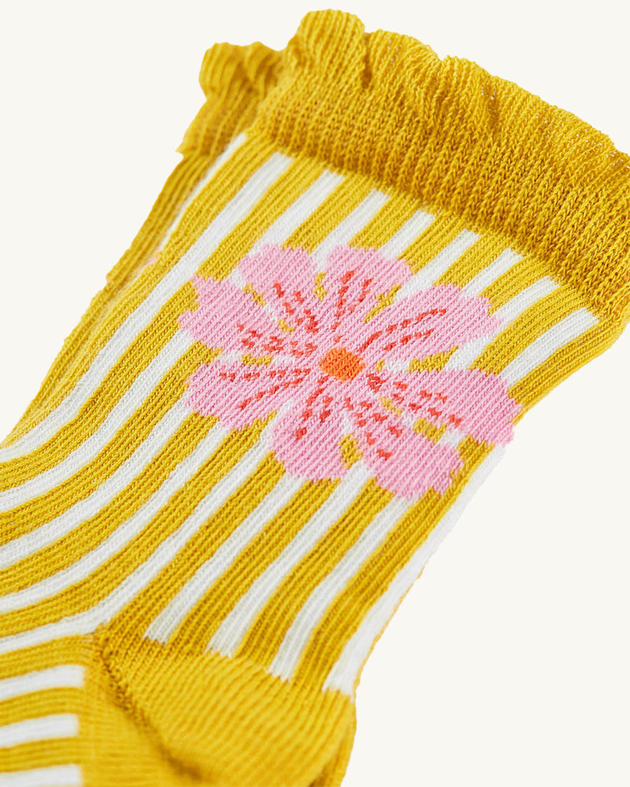  frilled socks come in pink and white stripe with a bunny