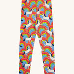 Frugi kids over the rainbow leggings - GOTS organic cotton Frugi kids leggings   in light blue with white horses on top of bright multicoloured rainbows 