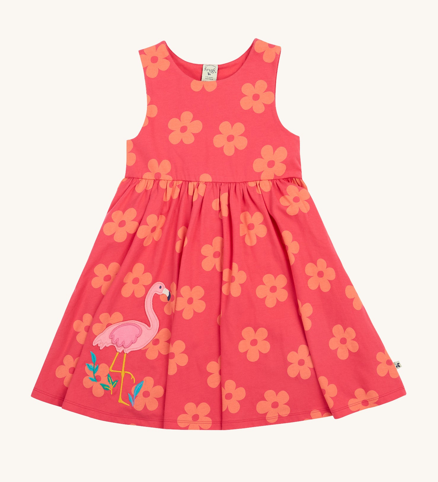 Frugi kids summer flamingo / flower dress - GOTS organic cotton Frugi kids sleeveless summer dress in pink with coral flowers all over the dress. Features a pink flamingo appliqué on the side of the dress