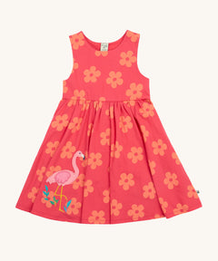 Frugi kids summer flamingo / flower dress - GOTS organic cotton Frugi kids sleeveless summer dress in pink with coral flowers all over the dress. Features a pink flamingo appliqué on the side of the dress