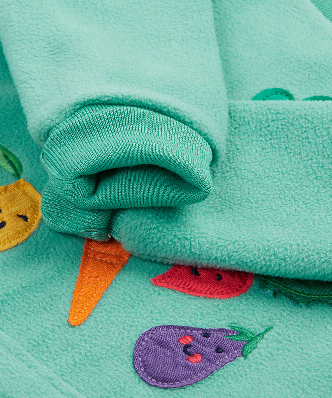 Frugi kids green fleece jumper with veg design cuff detail