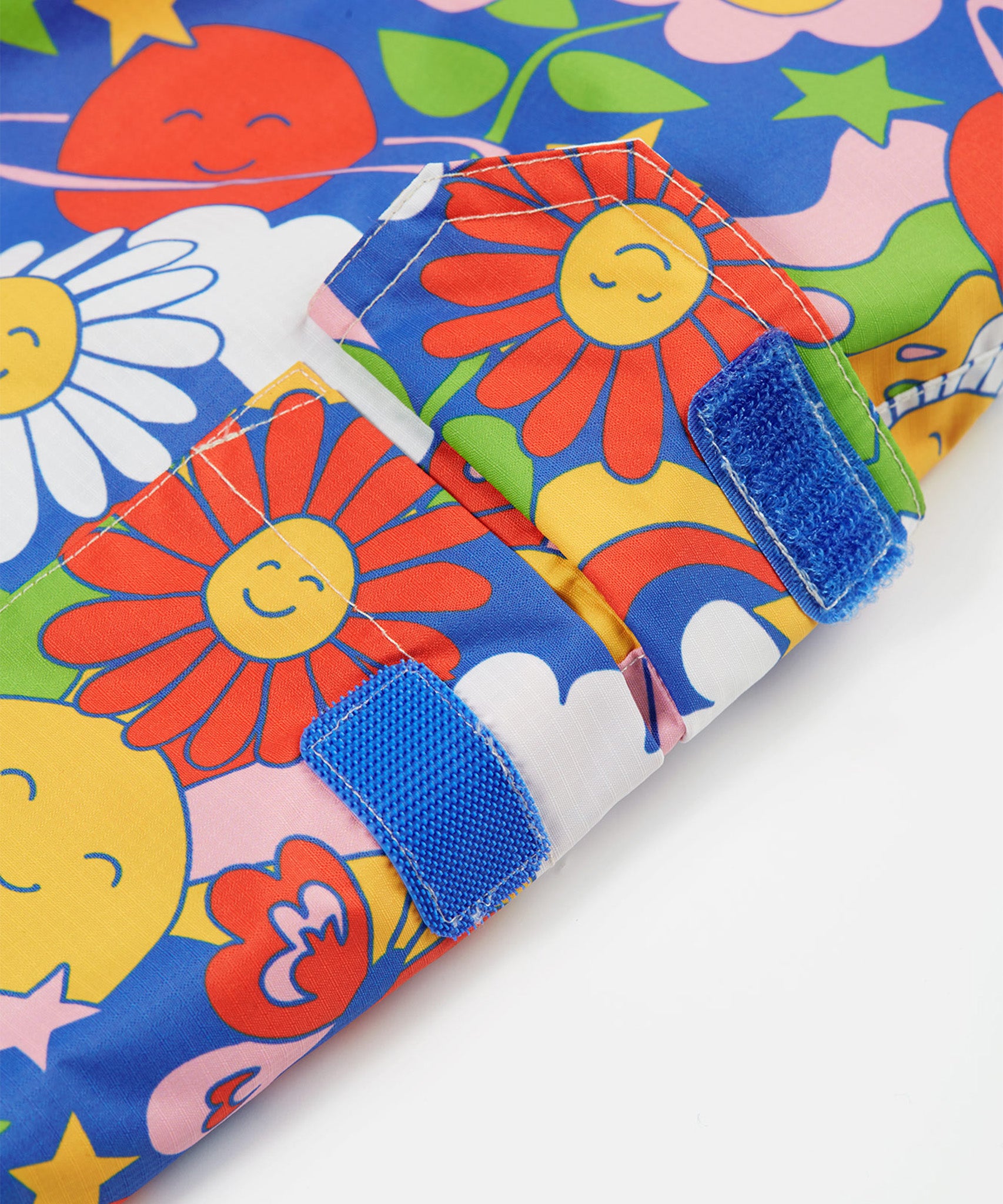 A closer look at the velcro fastenings on the Frugi Snow & Ski Salopettes - Retro Happy