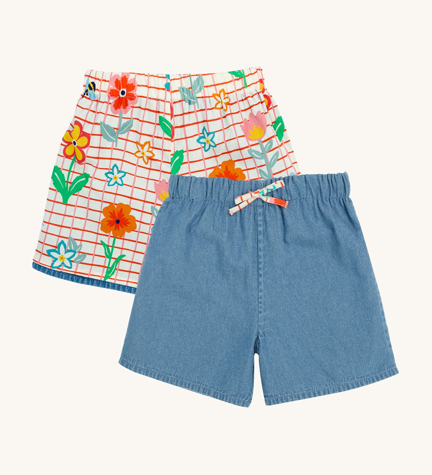 Frugi marigold reversible shorts, paint a floral / denim - GOTS organic cotton kids reversible shorts with a white and red check design on one side and denim on the other. Red check short features a floral design 