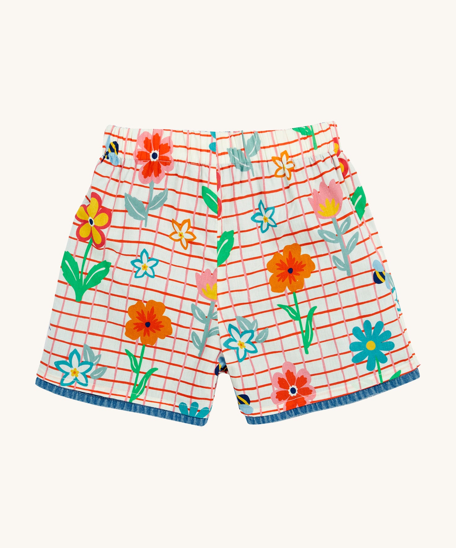 Frugi marigold reversible shorts, paint a floral / denim - GOTS organic cotton kids reversible shorts showing the white and red check shorts 