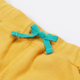 Close up of the Frugi kids bumblebee Samson shorts showing the turquoise waist drawstring on yellow organic cotton fabric