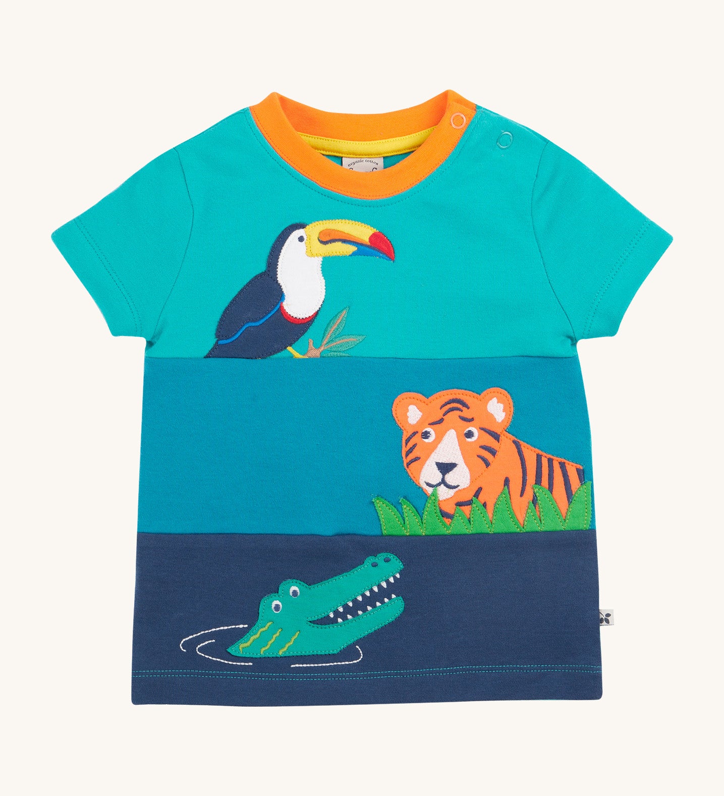 Frugi kids sea, land canopy short sleeve t-shirt - GOTS organic cotton Frugi kids t-shirt with different shades of blue, short sleeve and orange neck trim. Features a crocodile, tiger and toucan apppliue and 2 shoulder popper fasteners for easy fitting. 