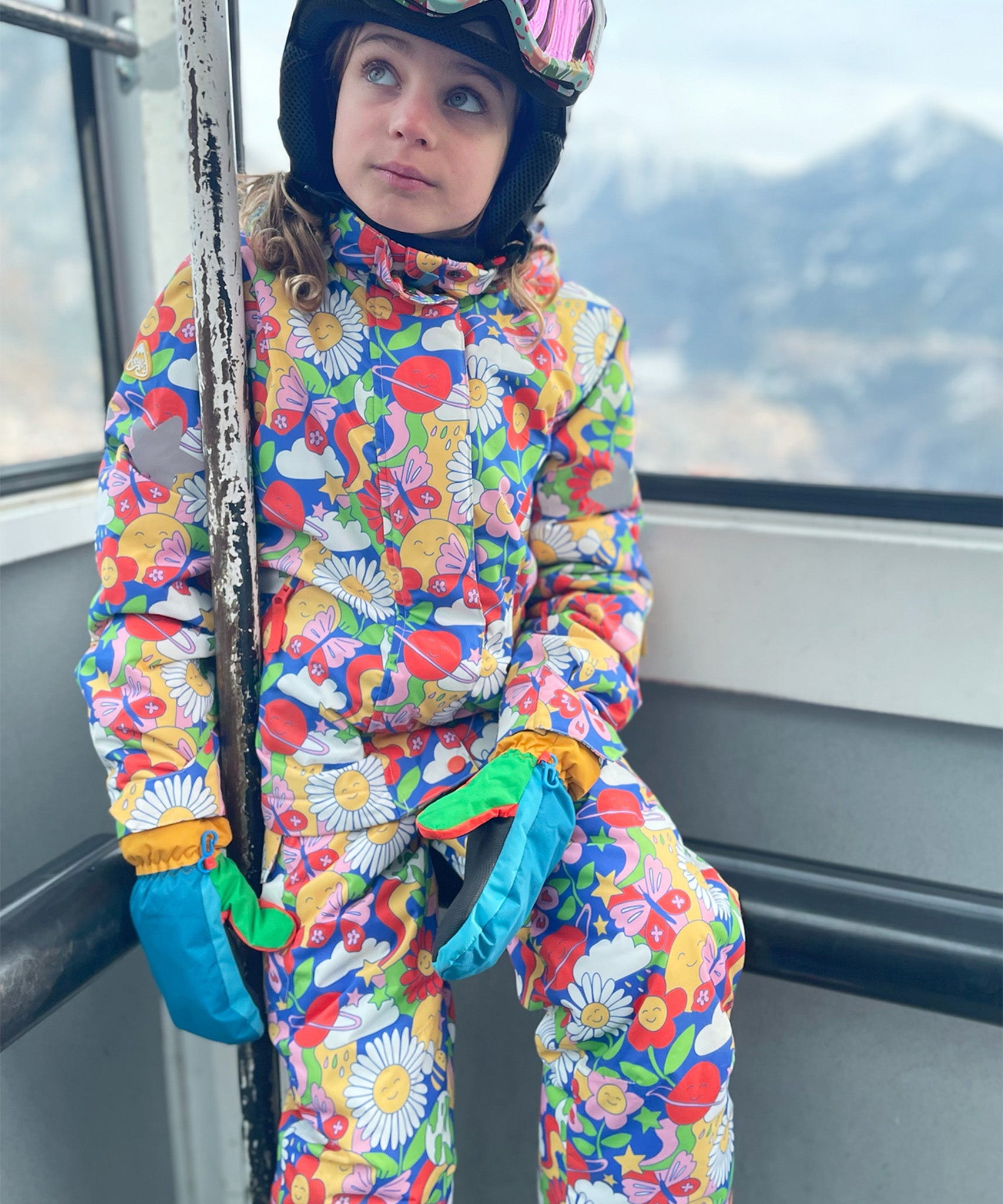  wearing the Frugi Snow & Ski Salopettes - Retro Happy