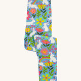 Frugi kids bunny bounce libby leggings - GOTS organic cotton kids light purple leggings folded. Features a flower and rainbow design with white bunny rabbits. 