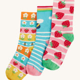 Frugi kids rock my socks strawberry bumblebee and flower design on a cream background.