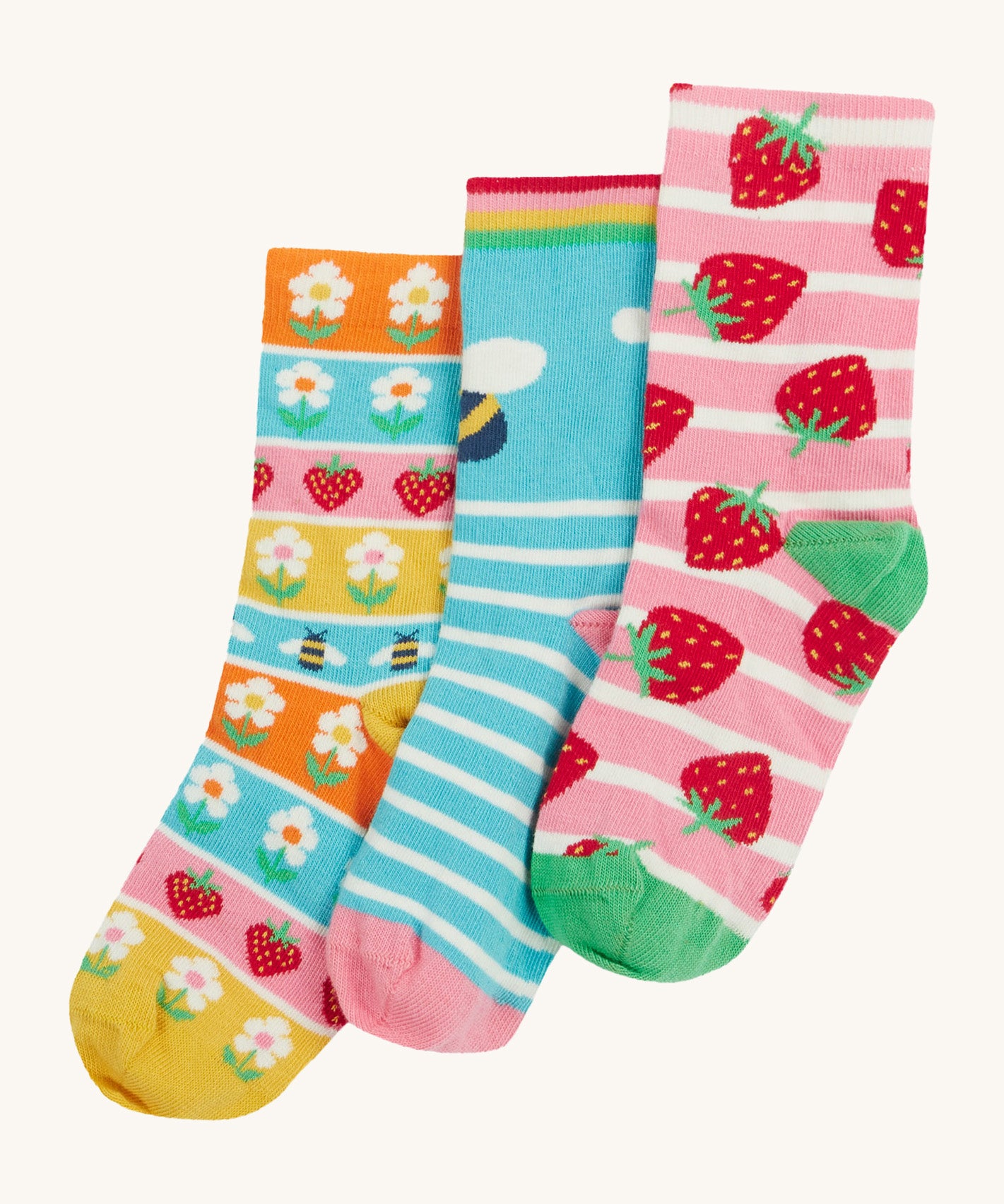 Frugi kids rock my socks strawberry bumblebee and flower design on a cream background.