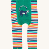 Frugi baby knitted lemur leggings - GOTS organic cotton baby knitted leggings with multicoloured stripes  and stars on the green waist and leg cuff. Features a lemur design on a green panel on the front. 