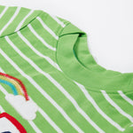 A close up of the Frugi kids breton easy on tractor jumper. Showing the green neck trim and the top part of the red tractor applique and a rainbow embroidery on green and white stripe organic cotton fabric