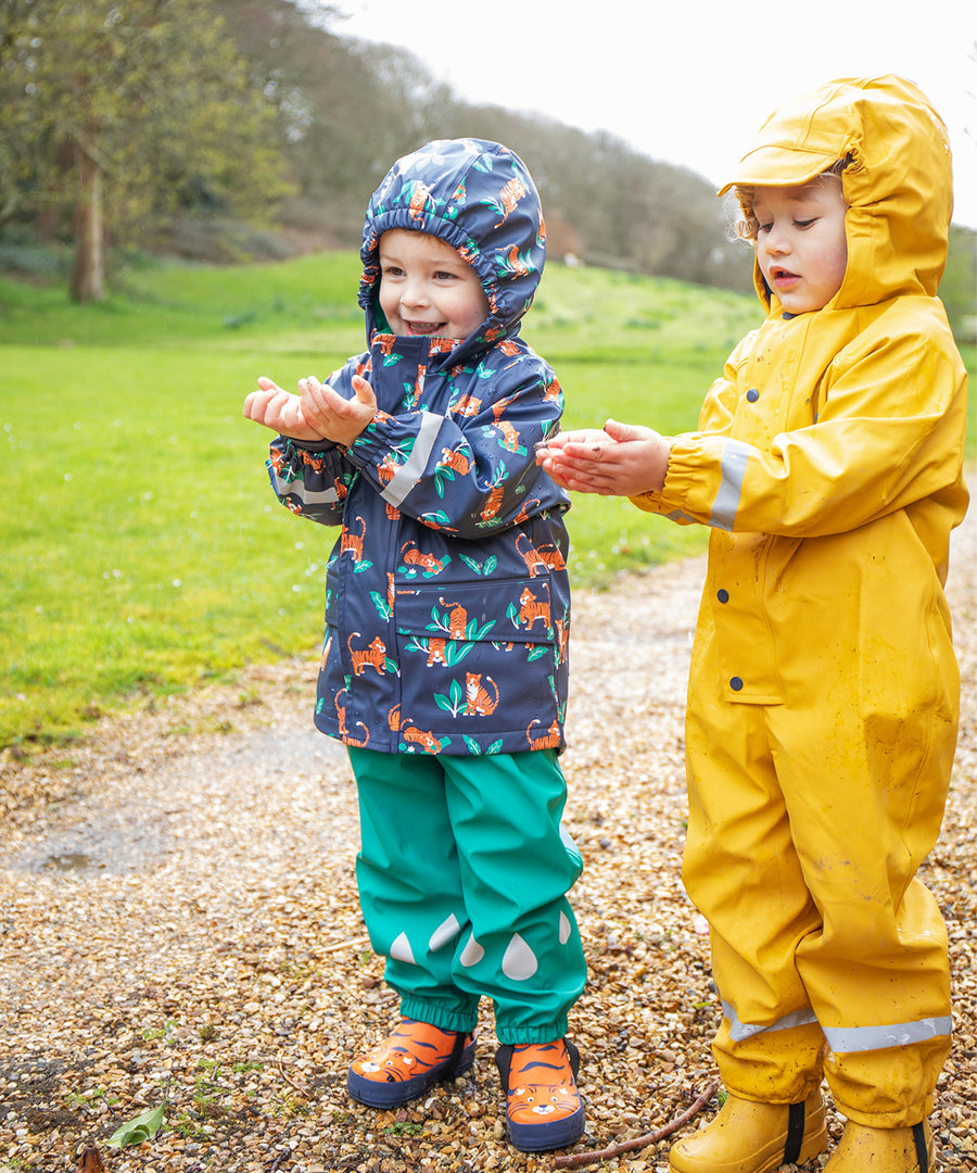 The back of the Frugi Children's Puddle Buster Trousers - Iguana Turquoise