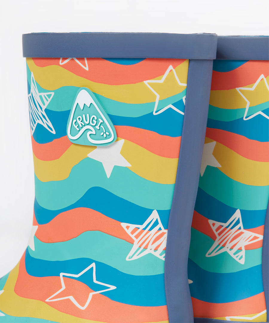 A closer view of the The Frugi Children's Puddle Buster Wellington Boots - Wavy Stars covered in water drops