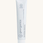 Front view of the Georganics activated charcoal hydroxyapatite toothpaste. A white tube with grey and black branding text. 