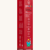 Side view of the Georganics strawberry hydroxyapatite toothpaste cardboard packaging, a red box with white text showing the instructions and features.