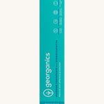 Front view of the Georganics activated charcoal hydroxyapatite toothpaste cardboard packaging, light green box with white and blue branding text. 