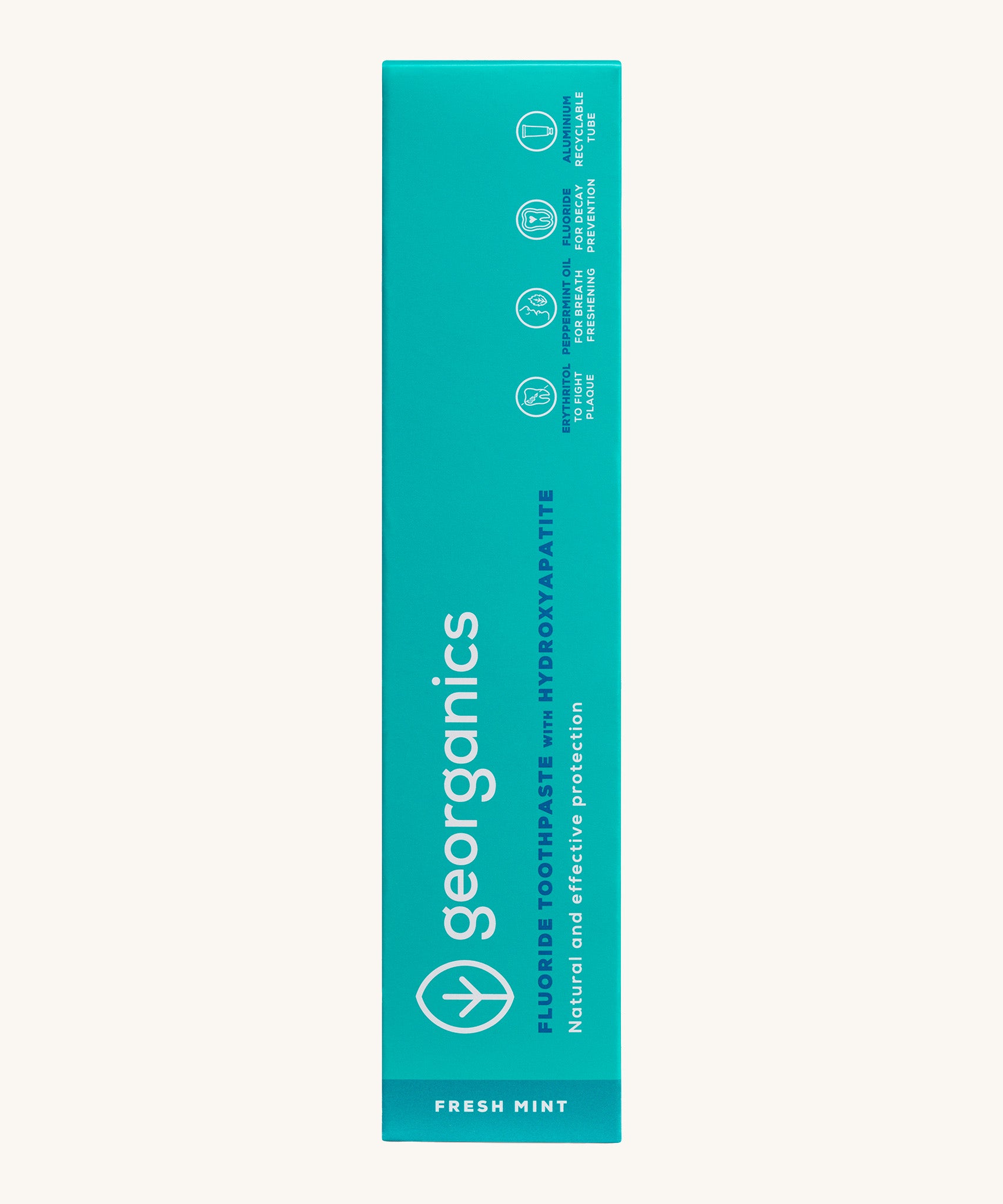 Front view of the Georganics activated charcoal hydroxyapatite toothpaste cardboard packaging, light green box with white and blue branding text. 