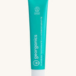 Front view of the Georganics fresh mint hydroxyapatite toothpaste. A light green tube with white and blue branding text. 