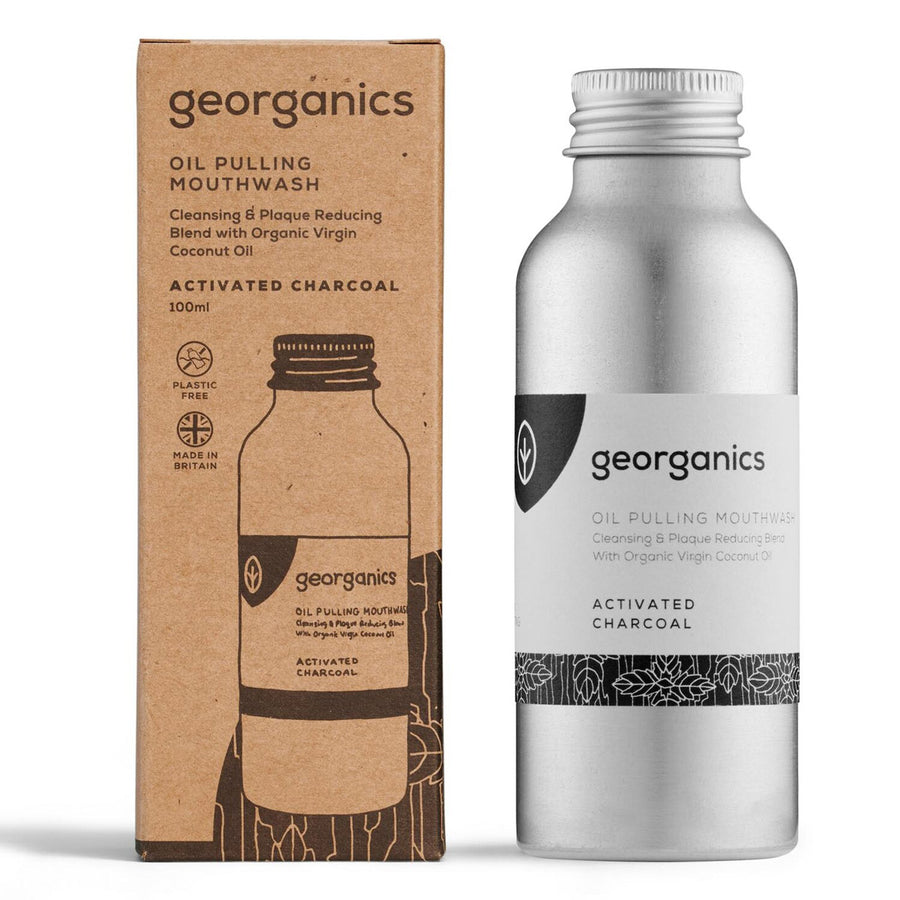 100ml bottle of Georganics vegan-friendly charcoal mouthwash on a white background next to its cardboard packaging