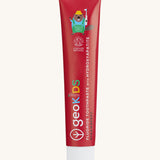 Front view of the Georganics strawberry hydroxyapatite toothpaste. A red tube with white lid. Features a playful beaver design and white branding text