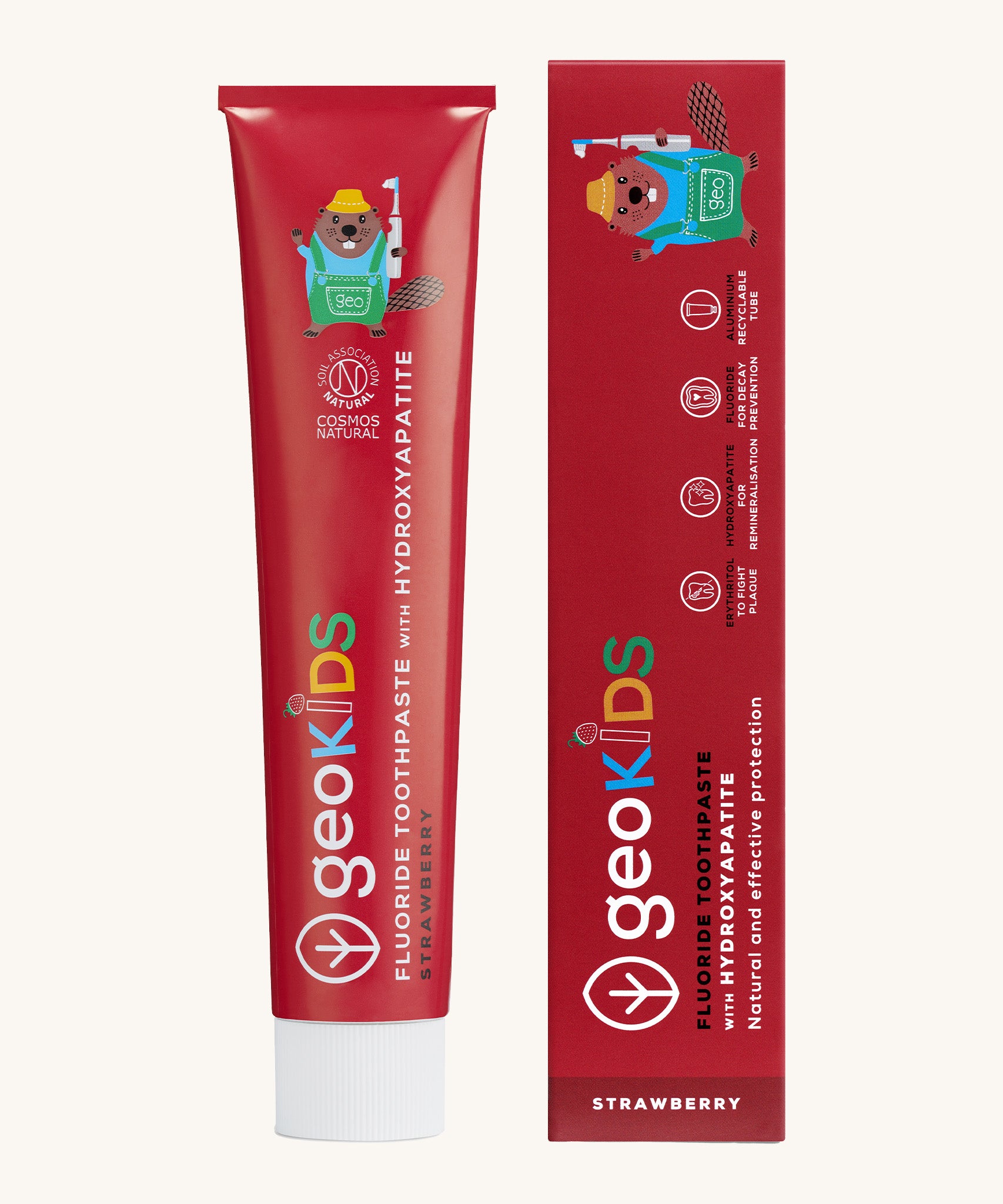 Front view of the Georganics strawberry hydroxyapatite toothpaste. A red tube with white branding text and a playful beaver design next to matching cardboard packaging. 