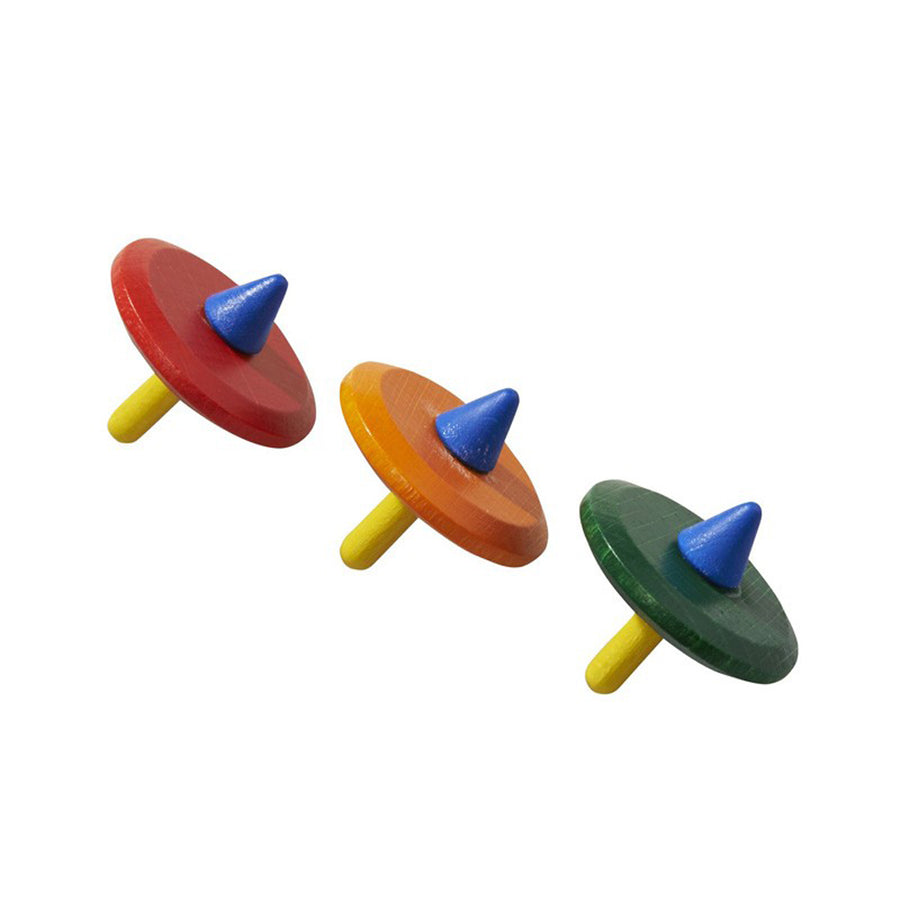 3 colourful wooden Gluckskafer disc spinning tops on a white background