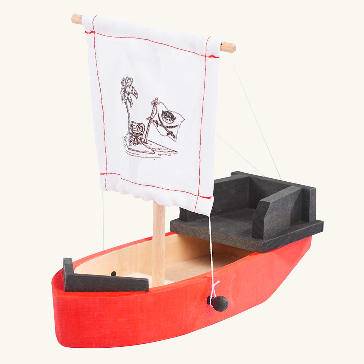 Gluckskafer kids wooden pirate ship toy on a beige background