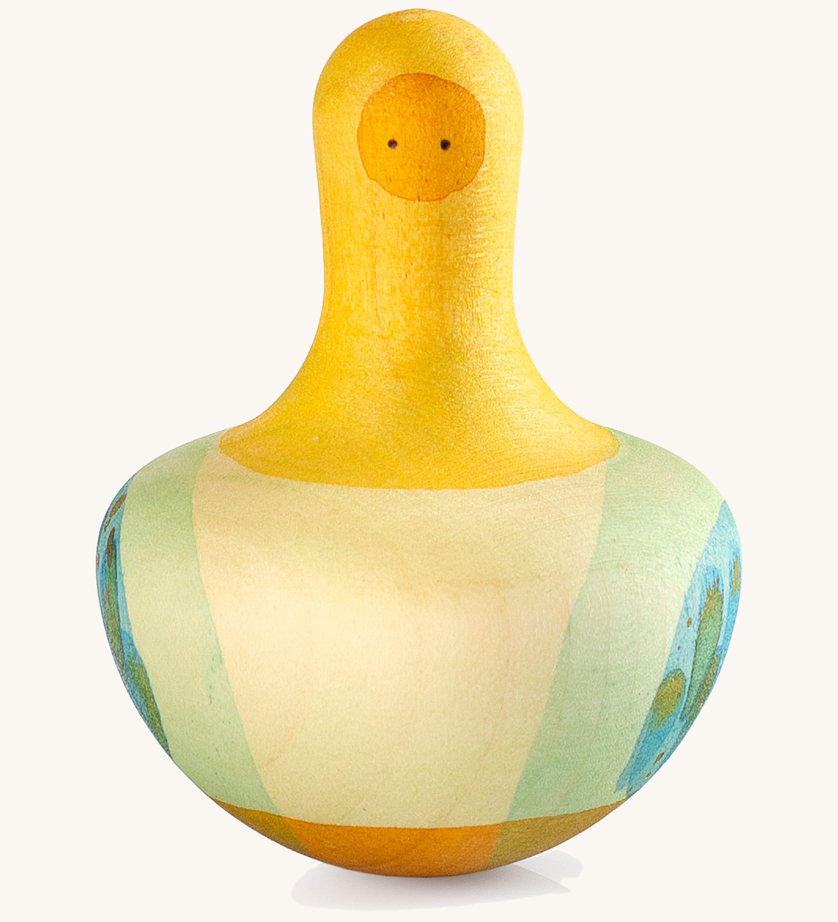 A Grapat yellow wooden flowing bird on a cream background.