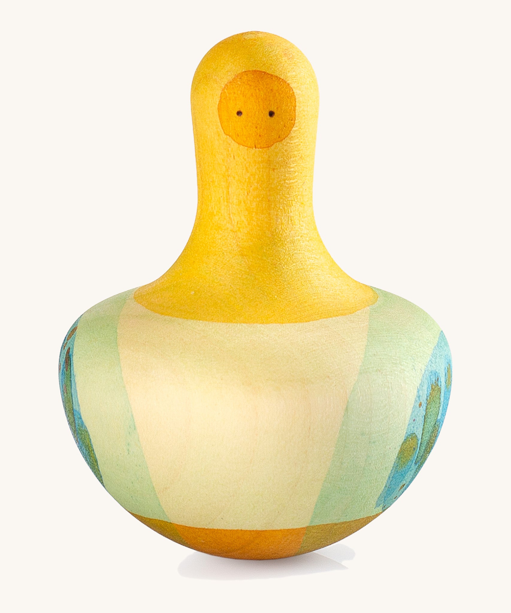 A Grapat yellow wooden flowing bird on a cream background.