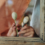 Grapat wooden twin soul puppets being played with 