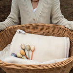 Grapat wooden twin soul puppets in a basket