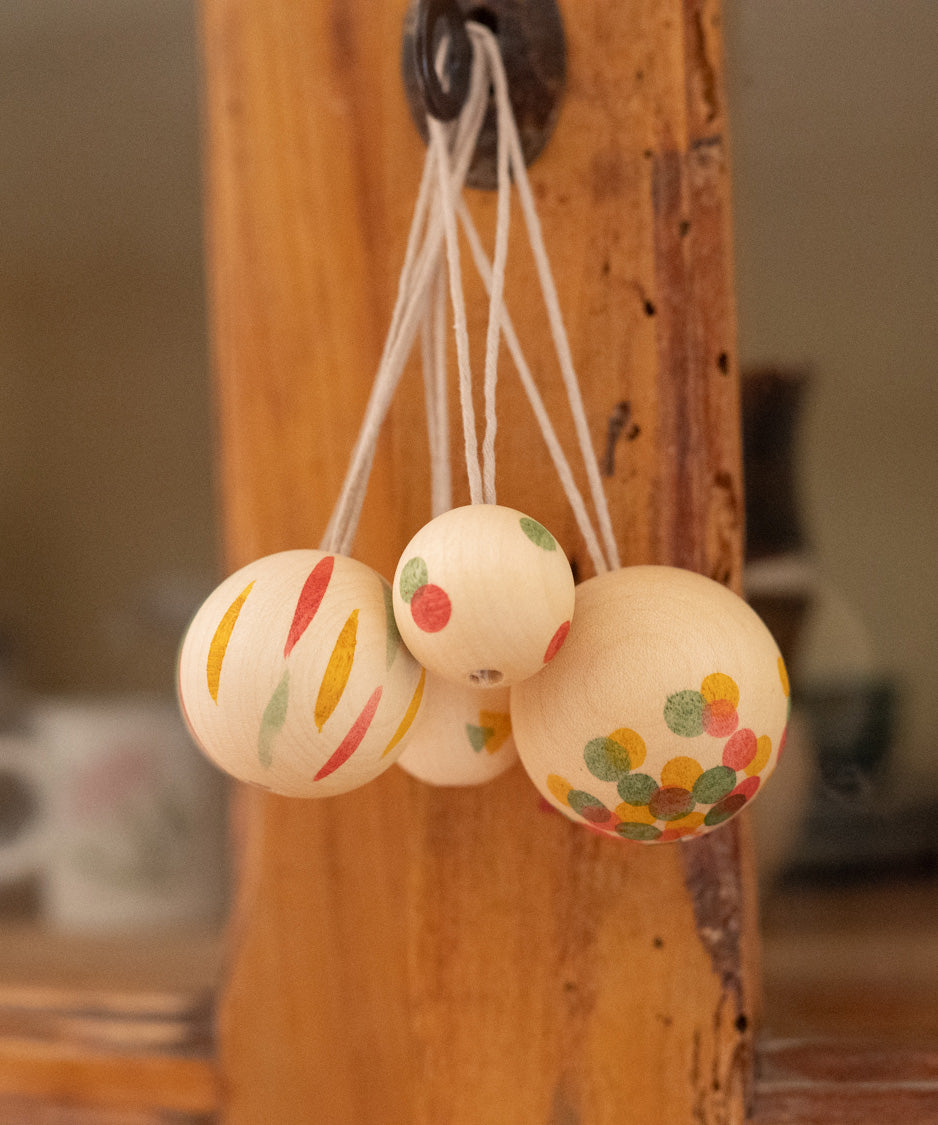 A photo of the wonder balls hanging on a hook