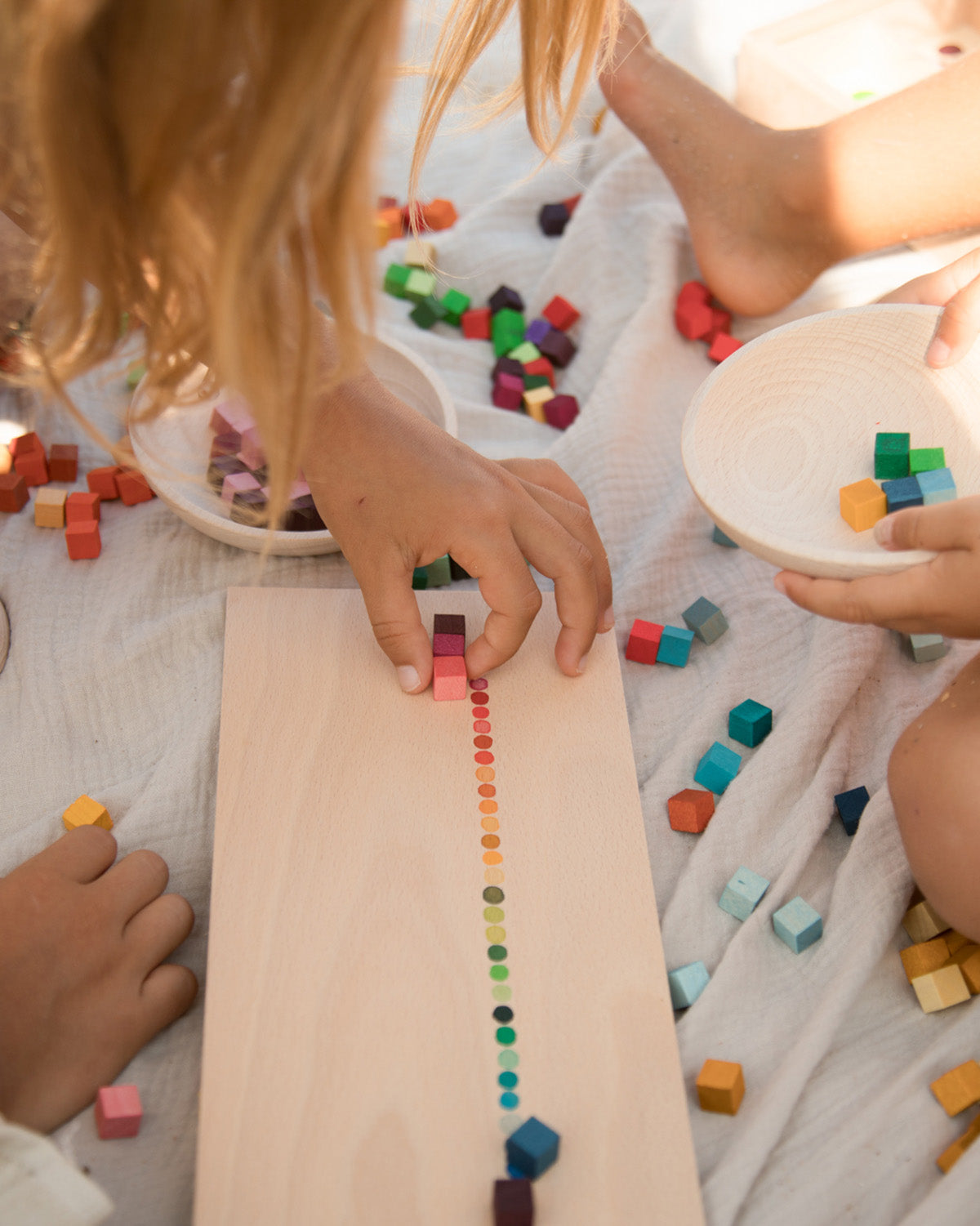 A child playing with the The Grapat Mis & Match play set