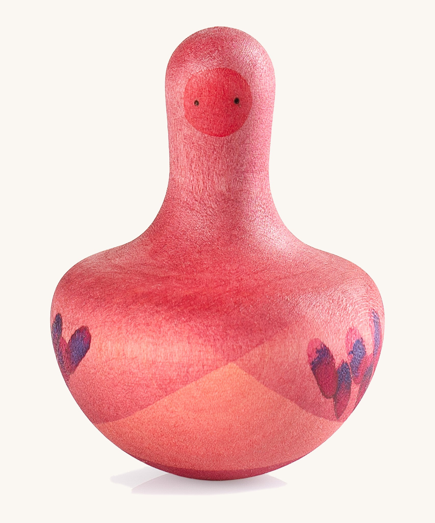 Grapat wooden pink chill bird on a cream background