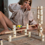 Grapat wooden woodland set tower stack played with by a child