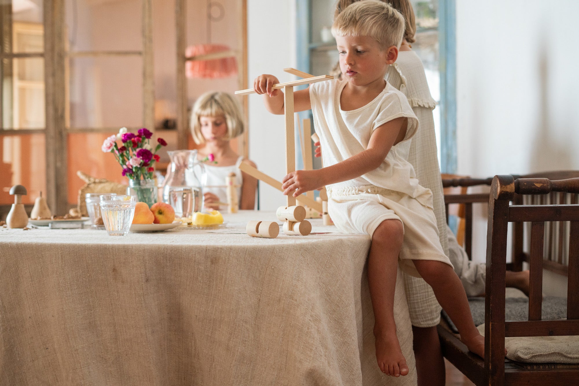 Grapat wooden woodland set balanced on a table