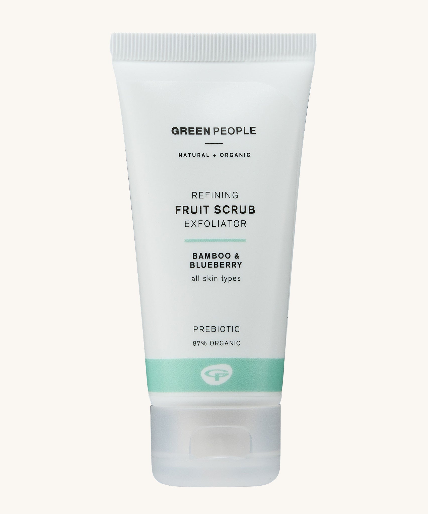 Green People Fruit Scrub Exfoliator on a plain background. 