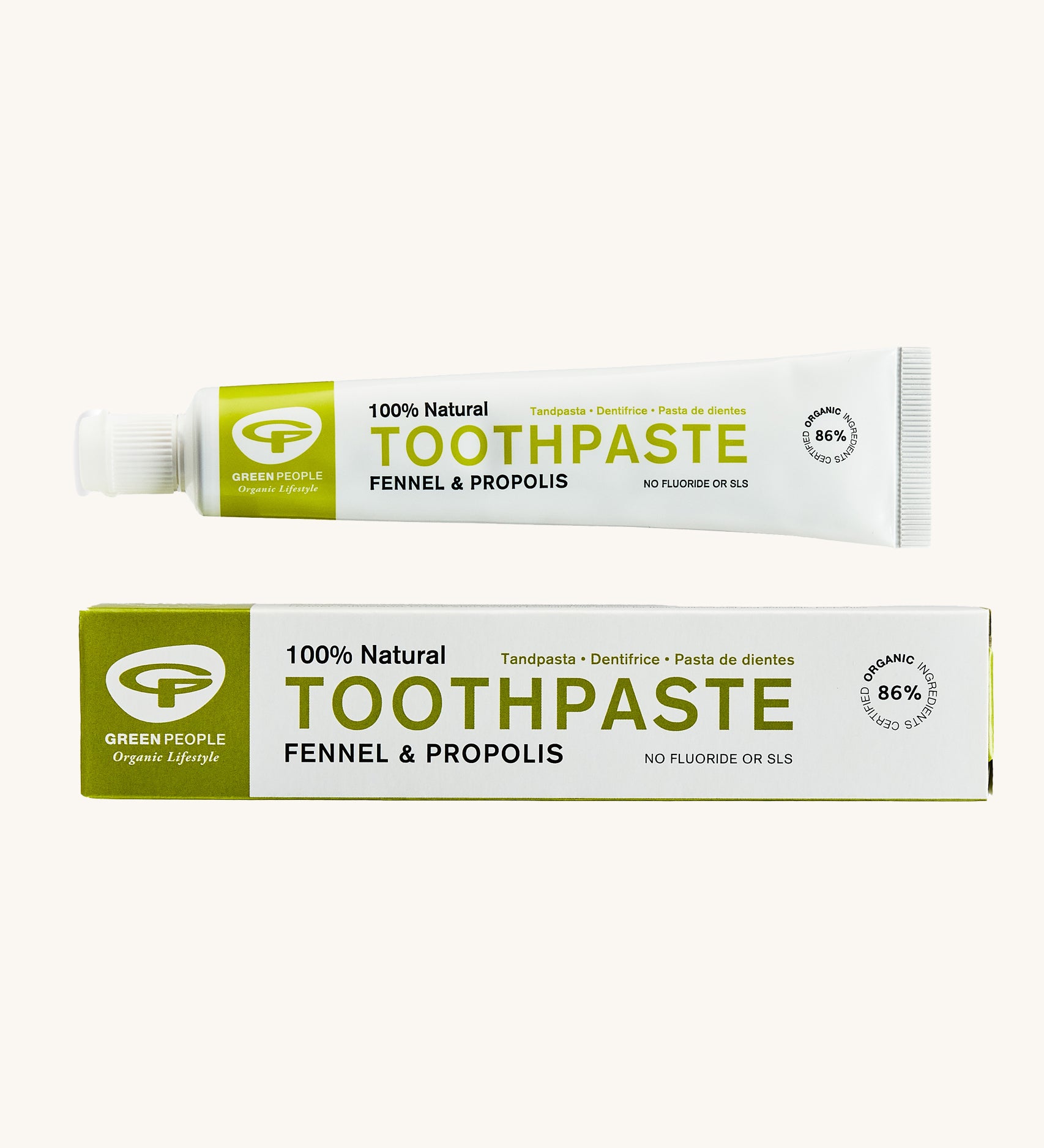 Green People Fennel & Propolis Natural Toothpaste on a plain background. 