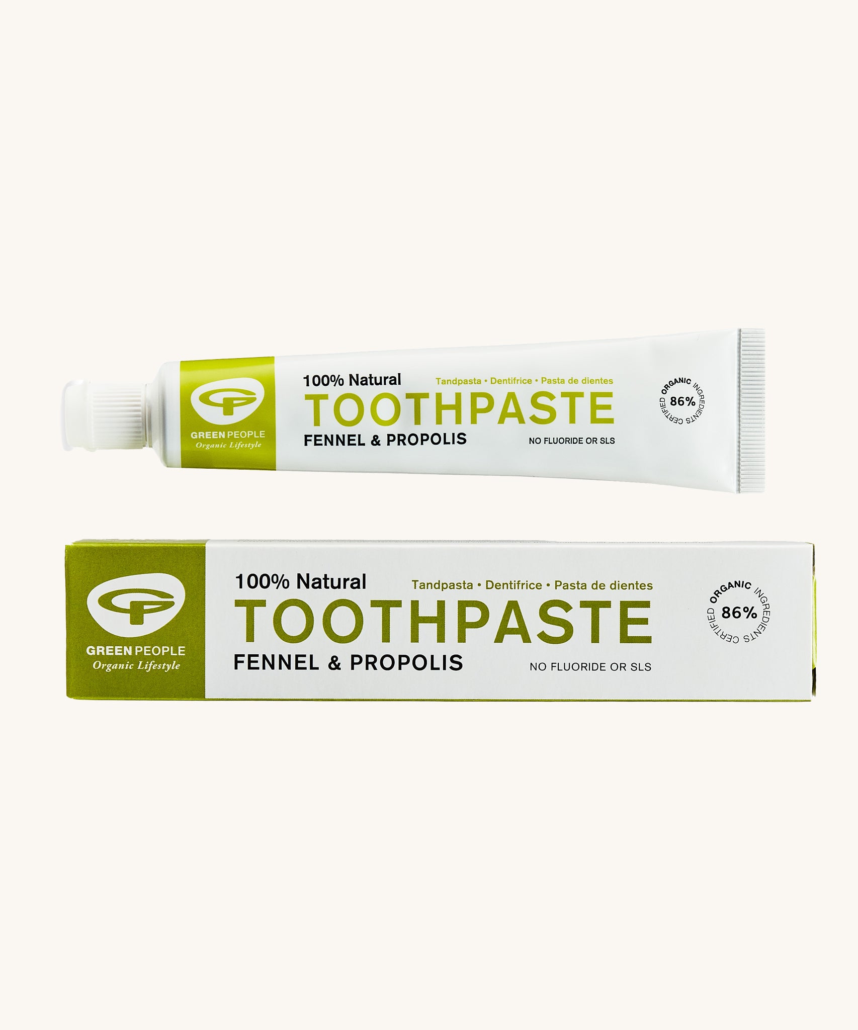 Green People Fennel & Propolis Natural Toothpaste on a plain background. 