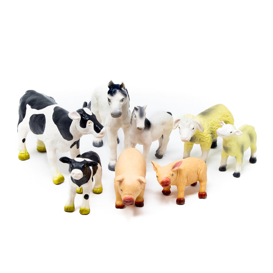 Green Rubber Toys natural rubber farm animals set on a white background