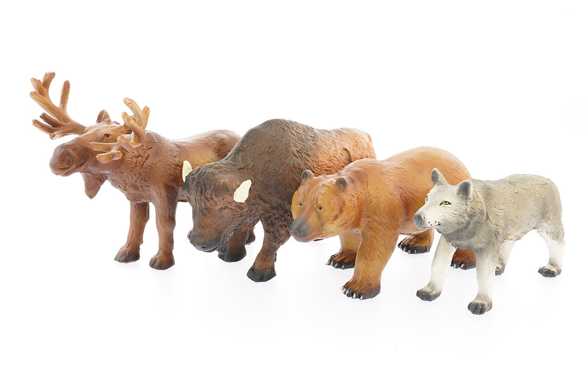 Green rubber toys eco-friendly Northern wild animals toy set on a white background