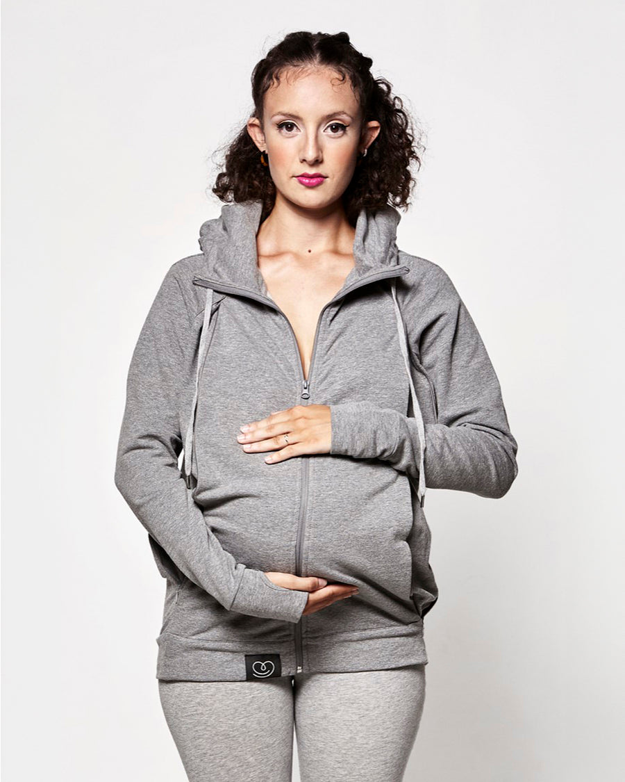 An adult wearing the Love Radius Parents Hoodie In Heather Grey slightly unzipped